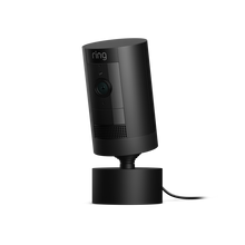 Negro:Stick Up Cam Plug-In con montura orientable